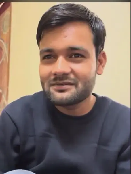 Sameer looking successful and protected from black magic in his office